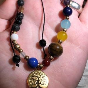 NWOT Handcrafted Lava Stone Solar System bracelet
